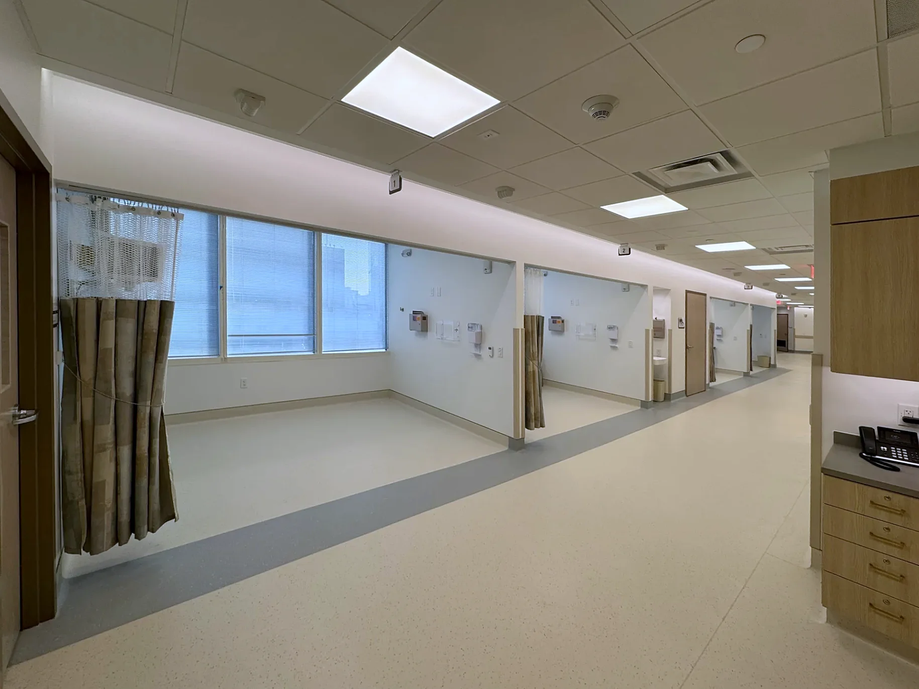 Pre-op patient bays with headwall power, lighting and devices by Texas A&E